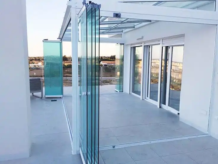 Cerramiento cristal ático con apertura plegable